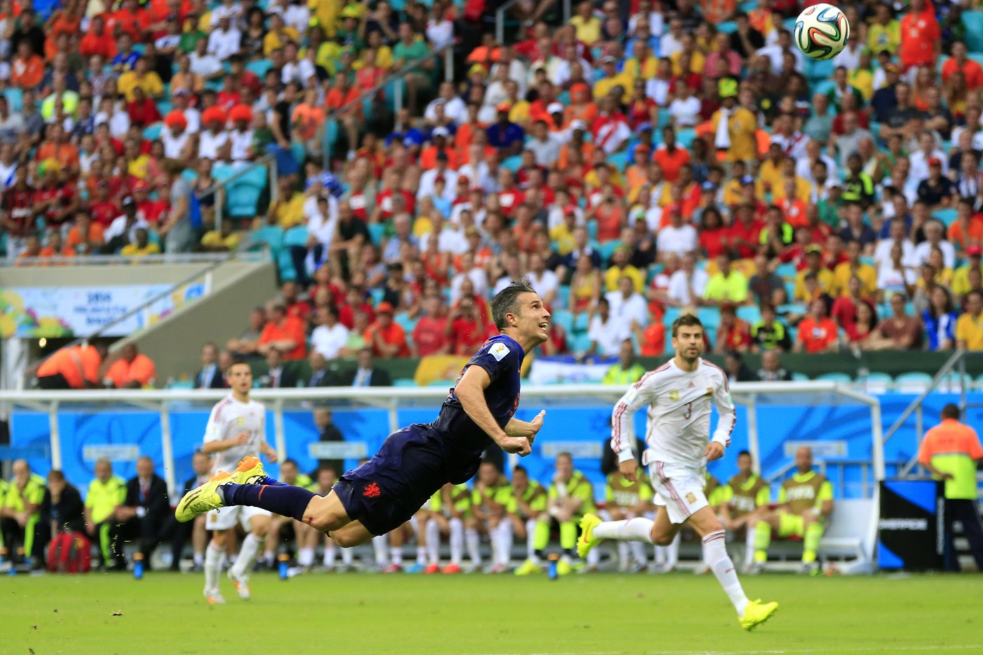 Netherlands' Robin van Persie scores a goal during the group B World Cup soccer match between Spain and the Netherlands. (AP Photo/Bernat Armangue)